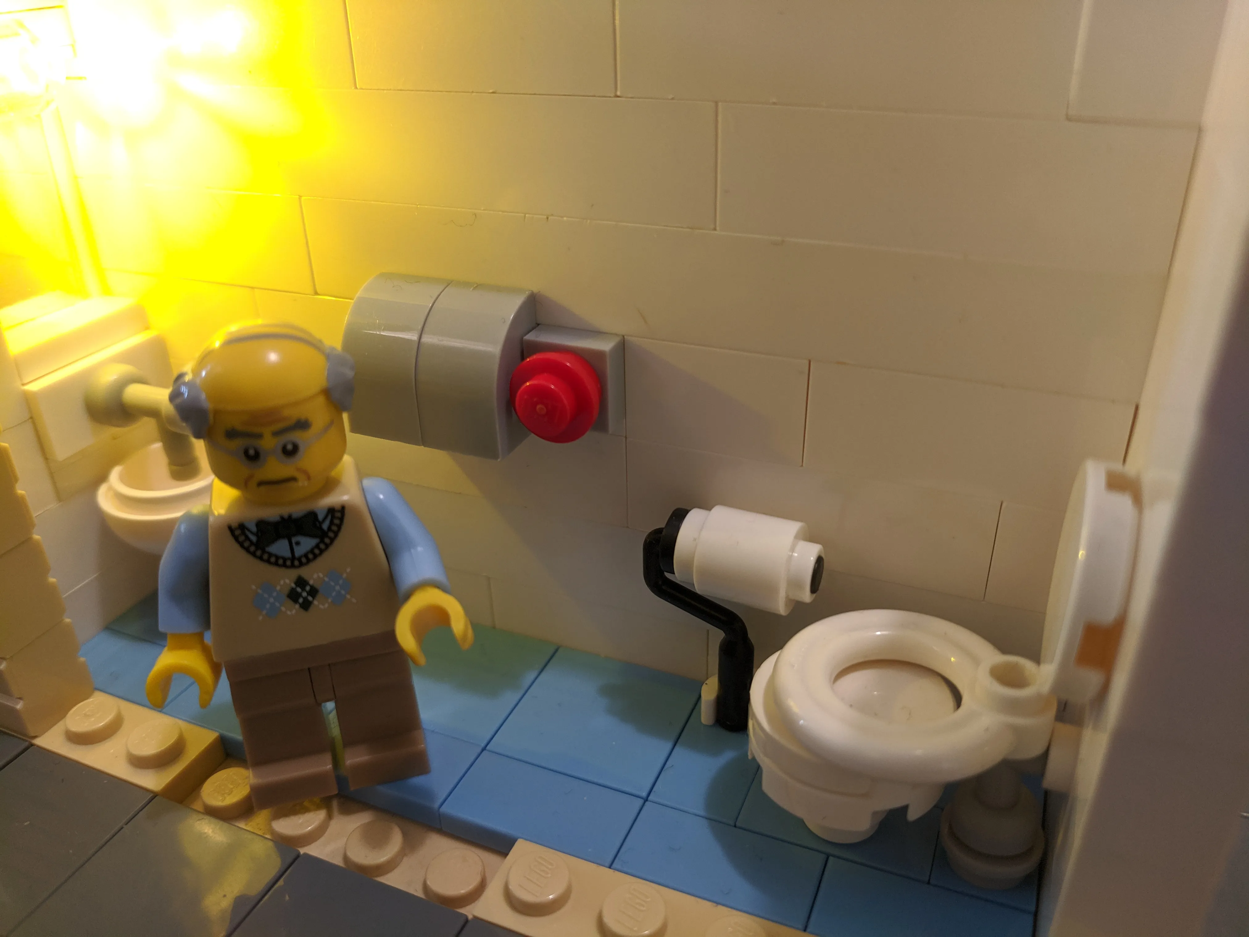 An old guy in the bathroom